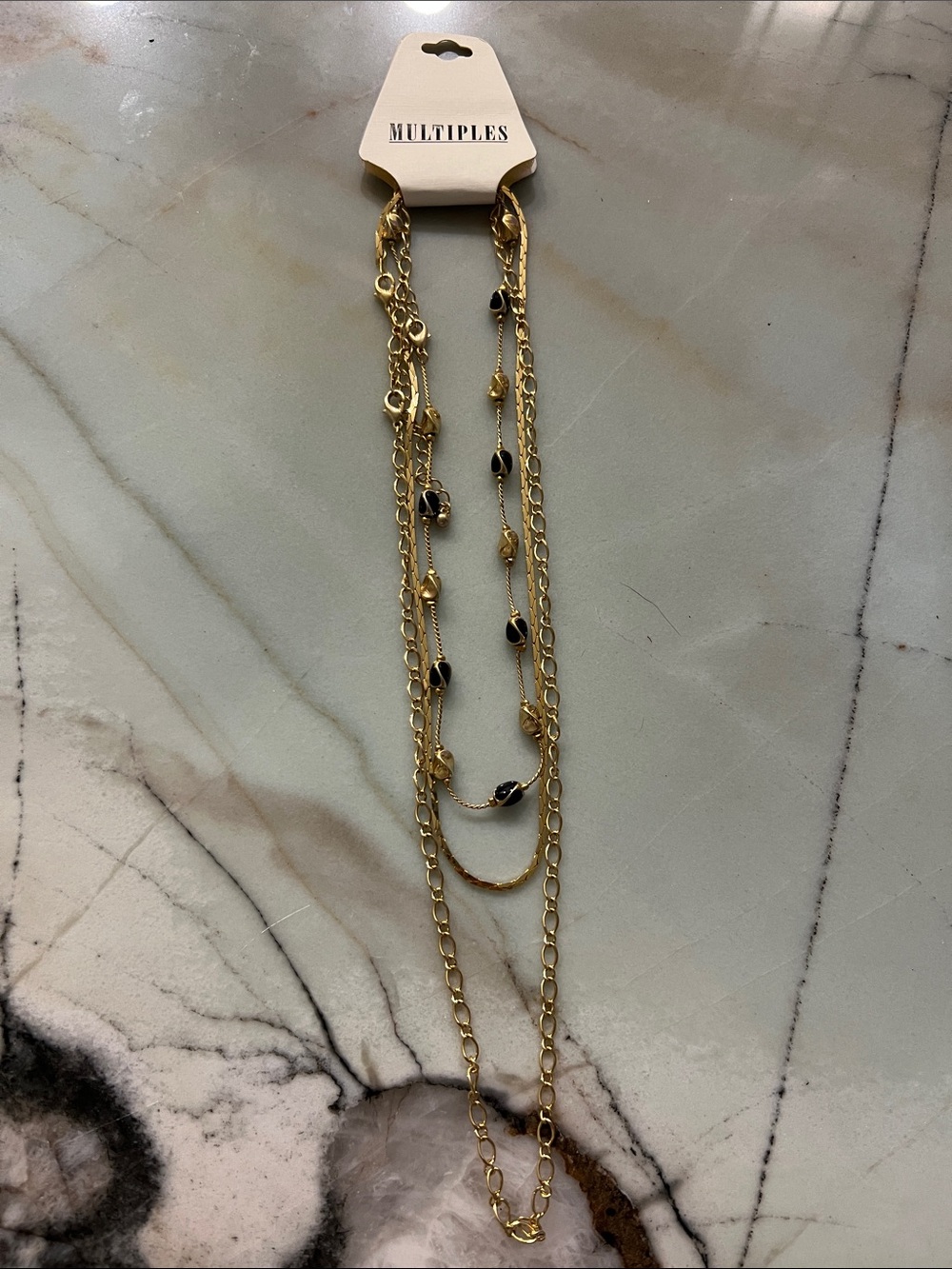 Multiples Gold Multi-Strand Necklace with Black Accents